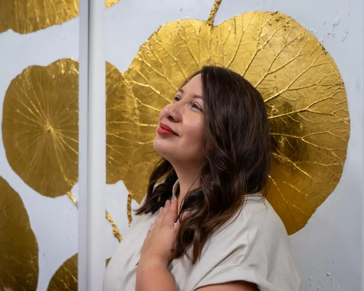 Sofia Mendoza against a gold backdrop